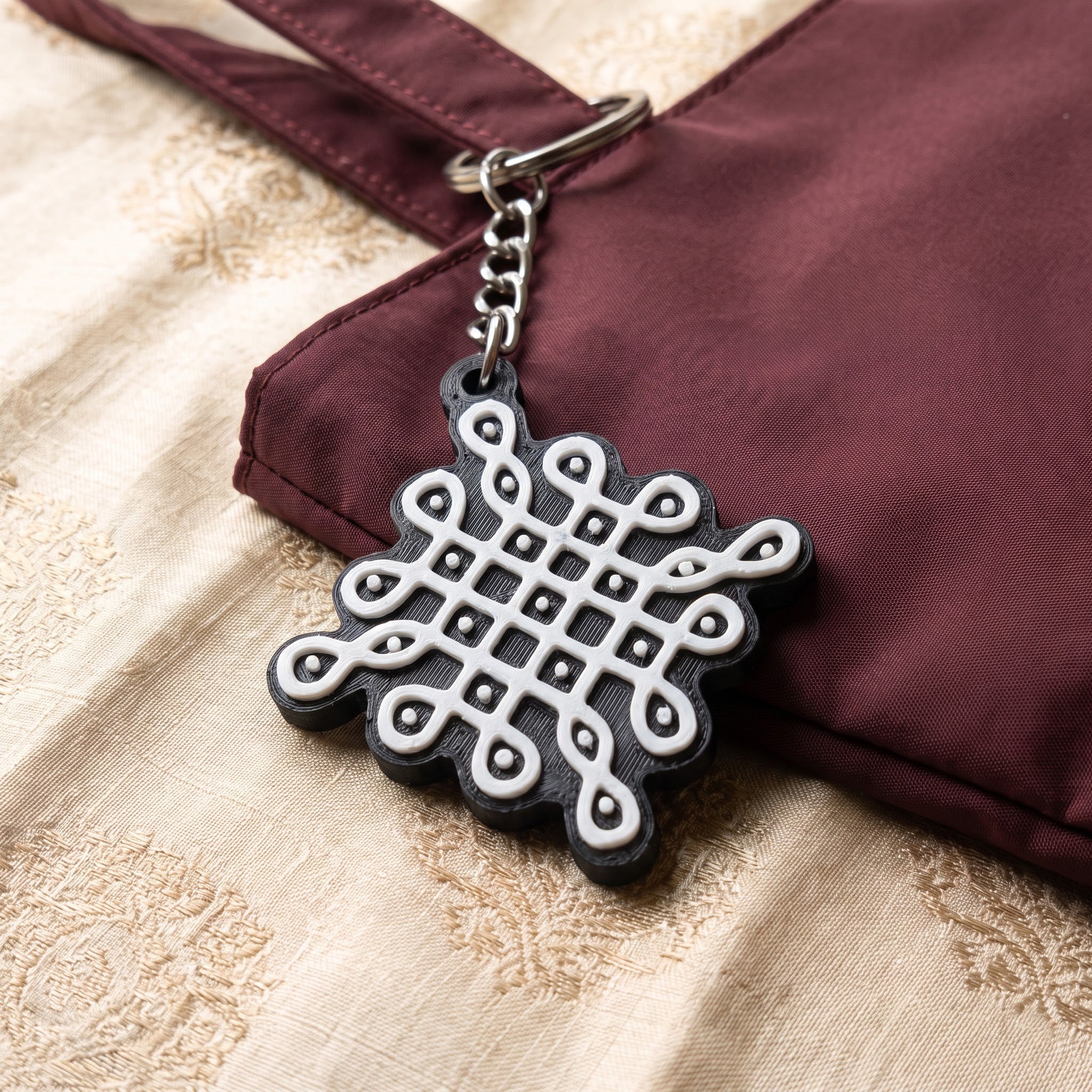 Kolam Keychain